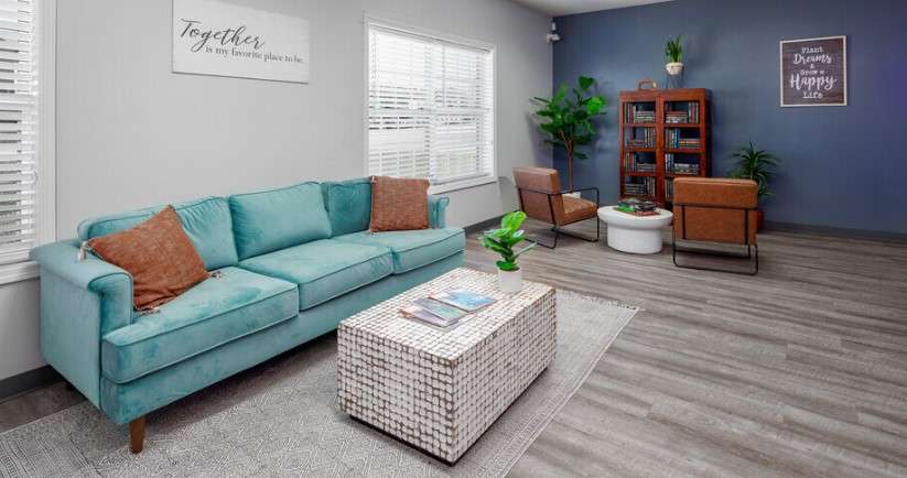 a living room with a couch and a coffee table