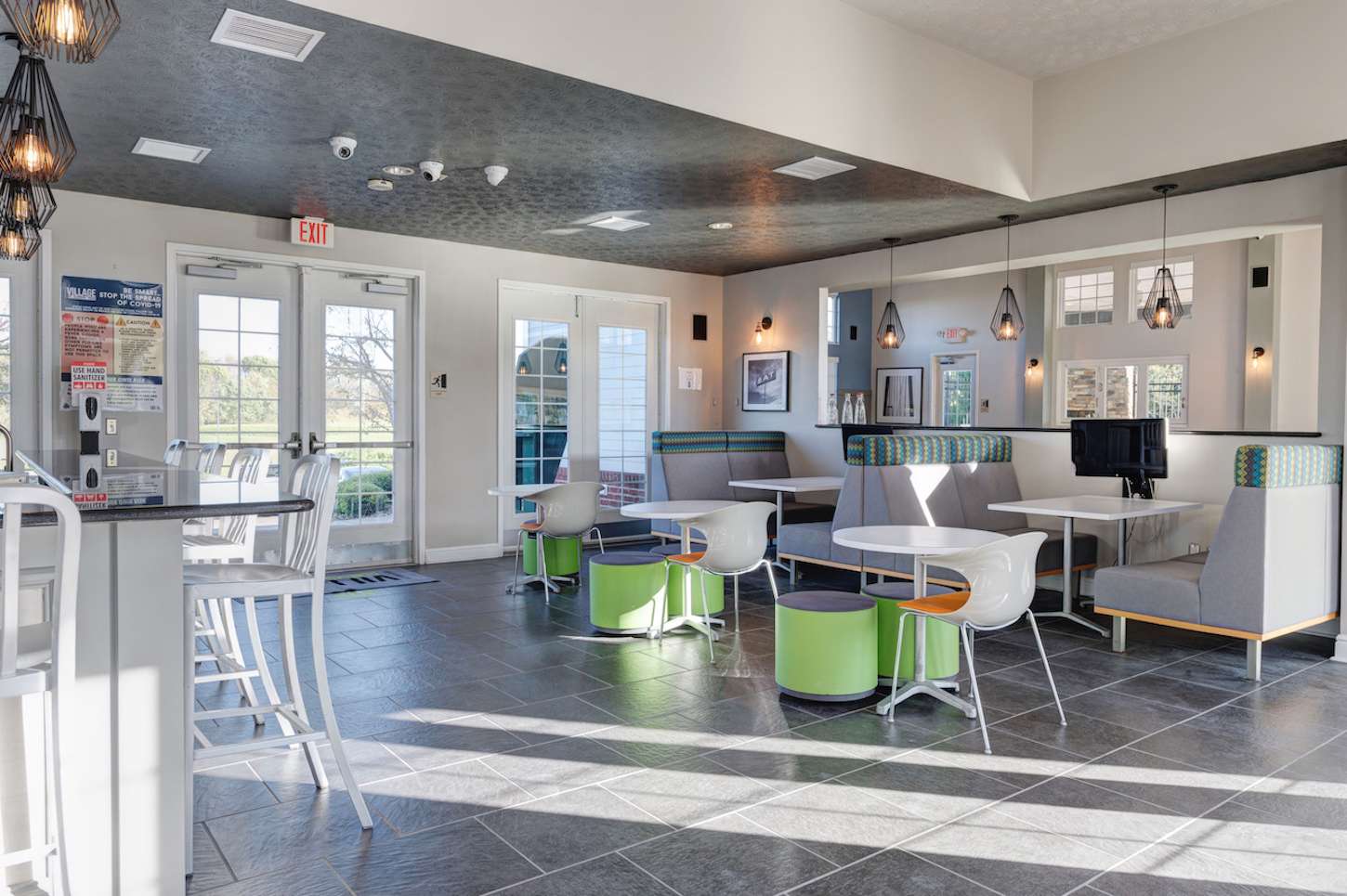 a room with tables and chairs