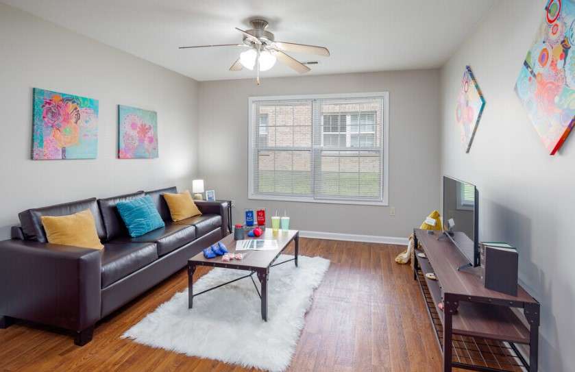 a living room with a couch and a table