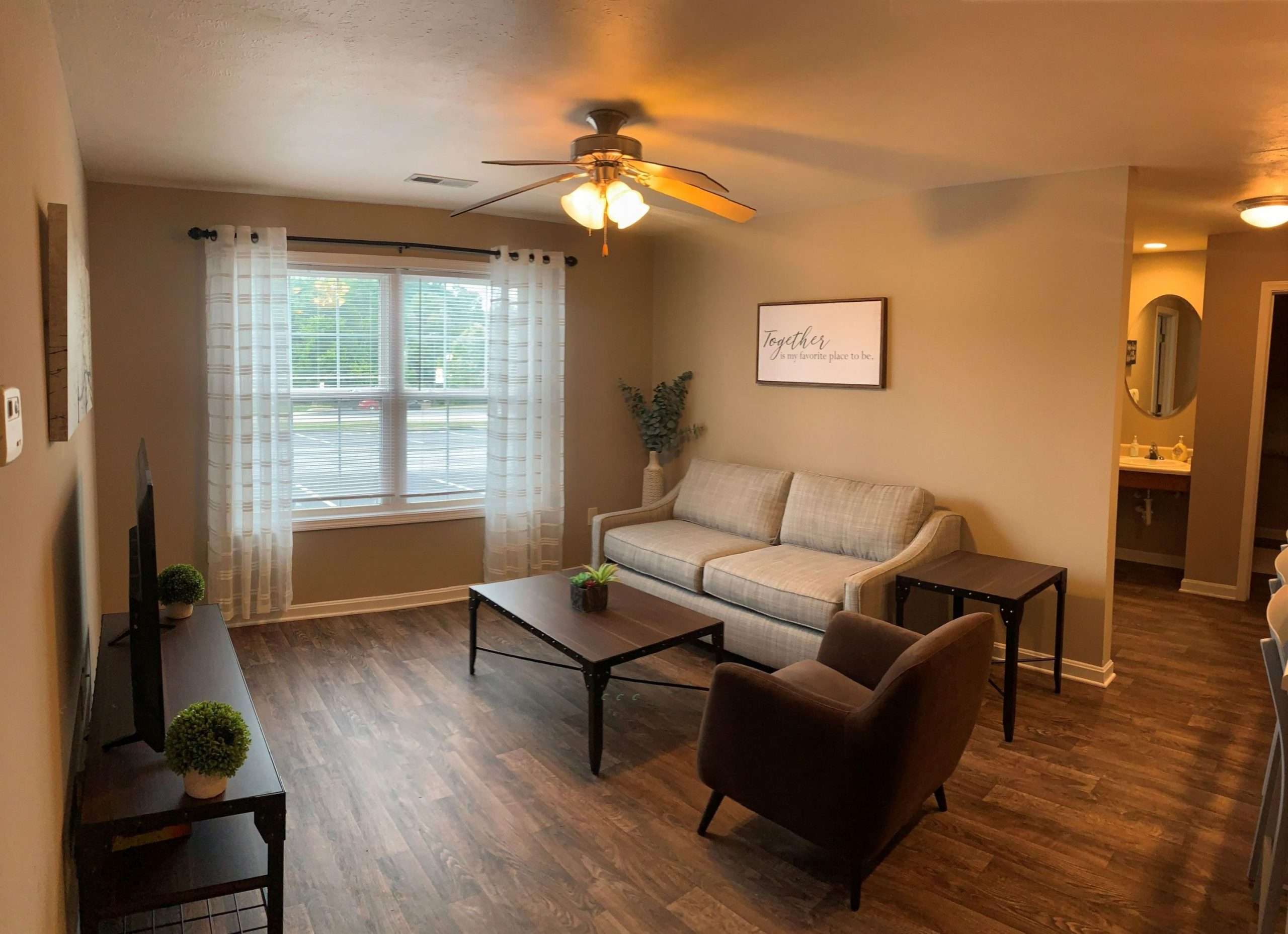 a living room with a couch and coffee table