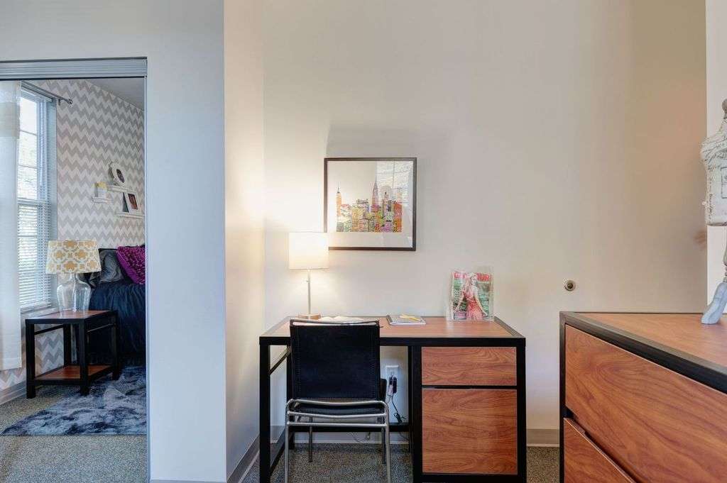 a desk and chair in a room