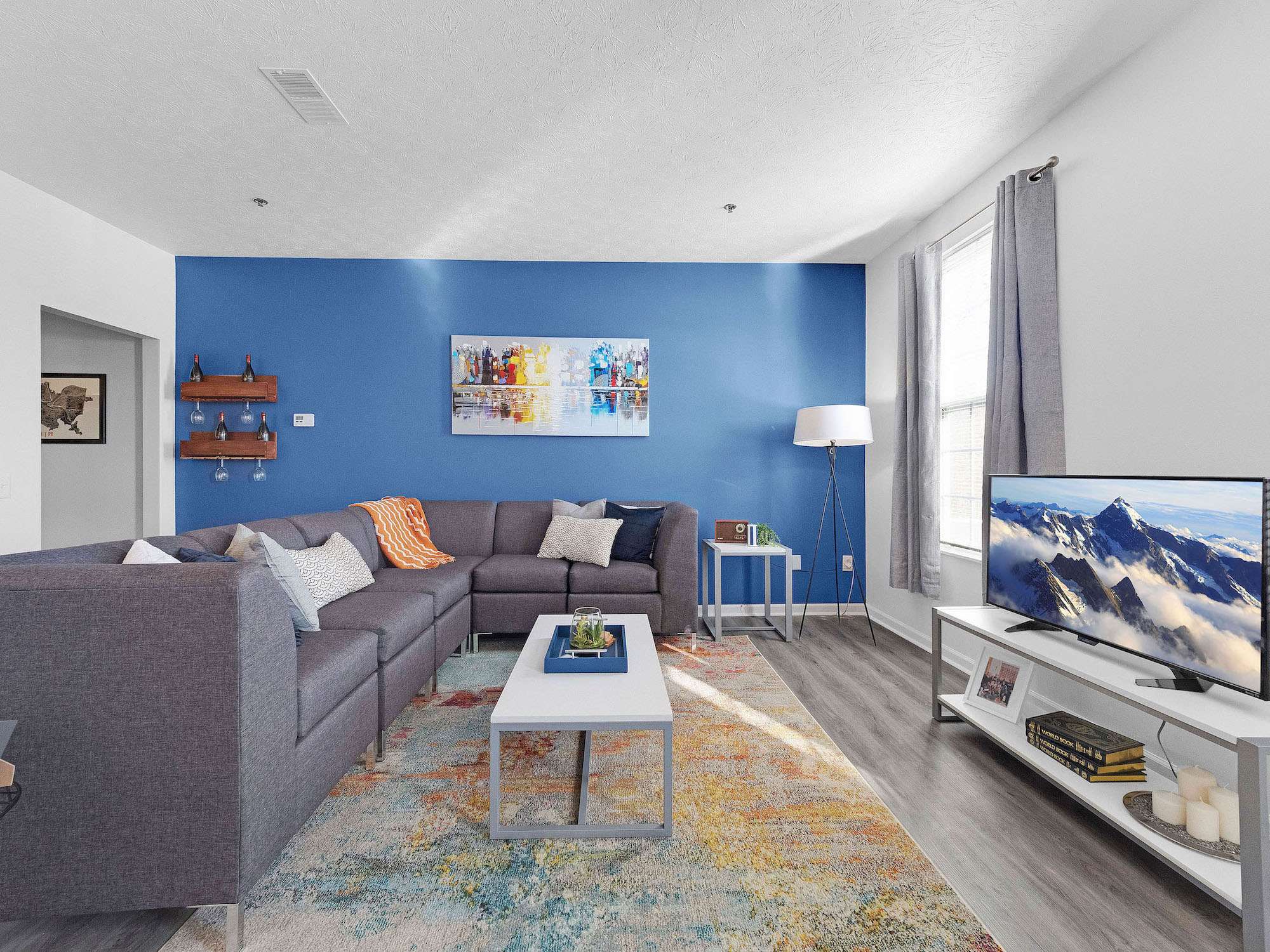 a living room with a couch and a tv